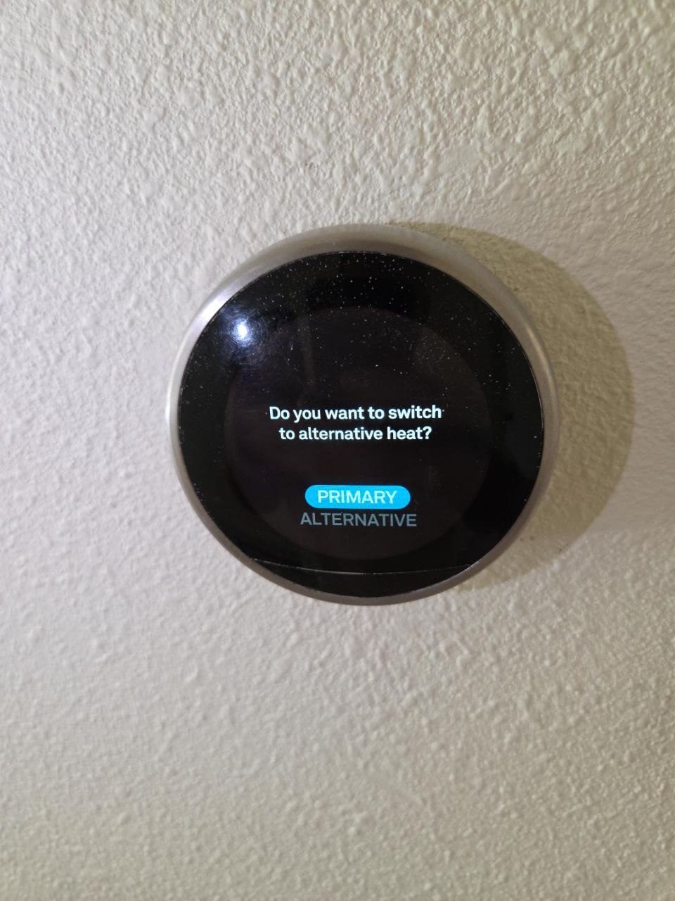 Smart thermostat set up for a heat pump with backup heat